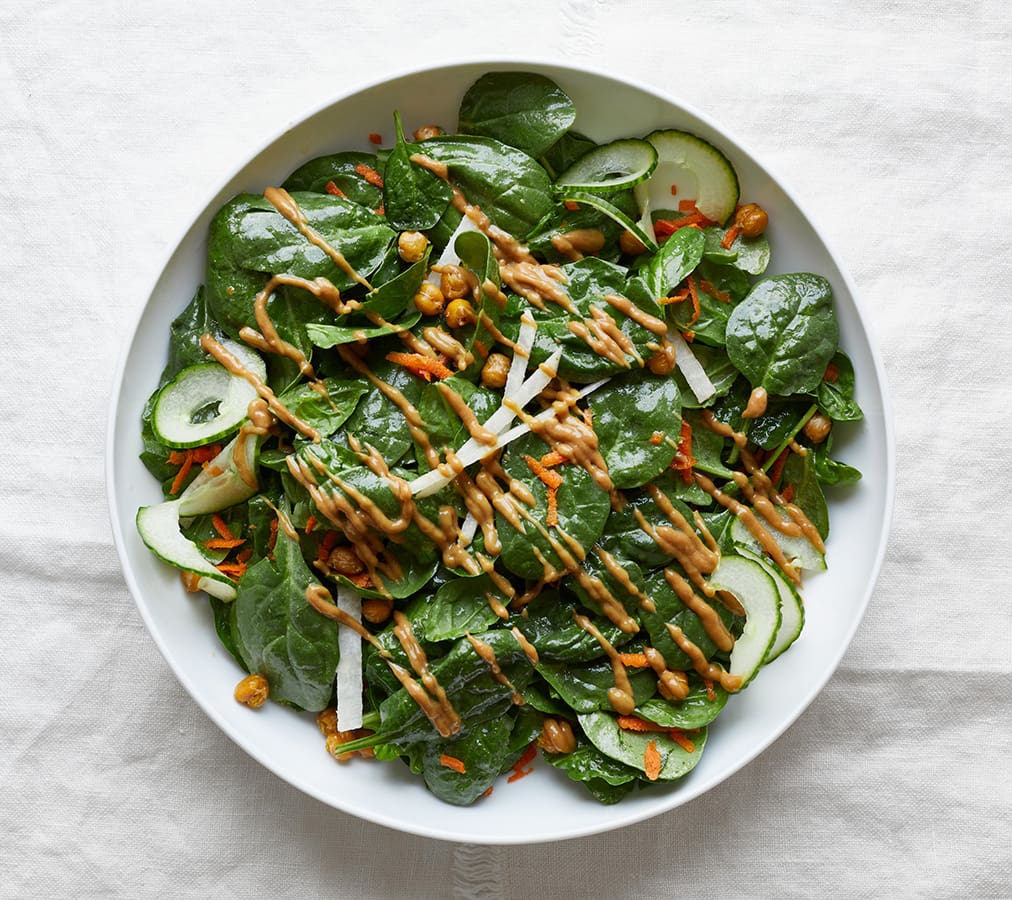 SPINACH SALAD WITH ROASTED CHICKPEAS AND PEANUT DRESSING